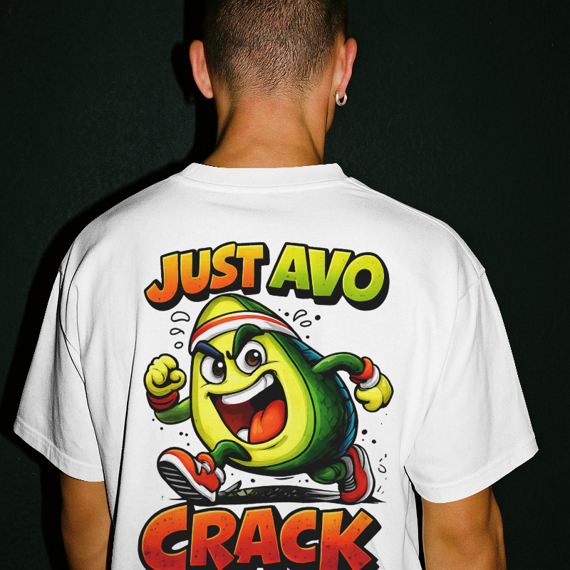 Person wearing a white t-shirt with an avocado graphic and text on the back against a black background